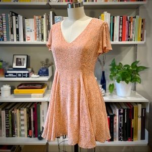 kimchi blue chiffon floral peach mini dress w/ flutter sleeve and v neckline